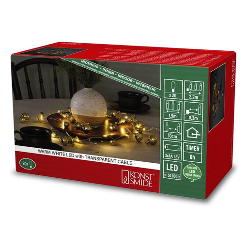 Produktbild LED-Lichterkette - Konstsmide LED Dekolichterkette, Perlen, messing farben, 6h Timer, 20 warm weiße Dioden
